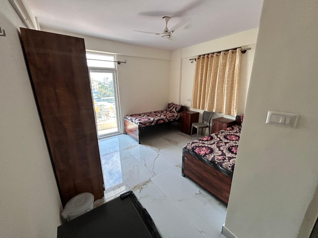 Pro Colive Pg room in Hsr layout Bangalore with premium furnishings and clean interiors — PG photo 1 of 7 Pro Colive Pg room in Hsr layout Bangalore with premium furnishings and clean interiors — PG photo 1 of 7