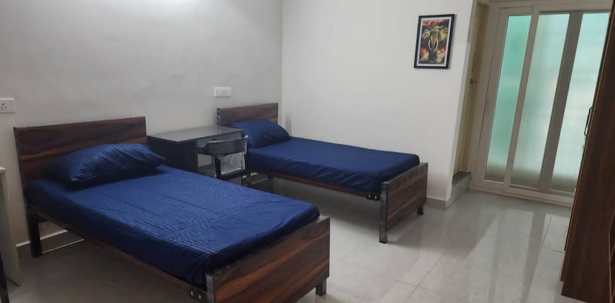Trident Coliving room in Whitefield Bangalore with premium furnishings and clean interiors — PG photo 1 of 8 Trident Coliving room in Whitefield Bangalore with premium furnishings and clean interiors — PG photo 1 of 8
